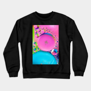 Colorful close up of oil drops in water Crewneck Sweatshirt